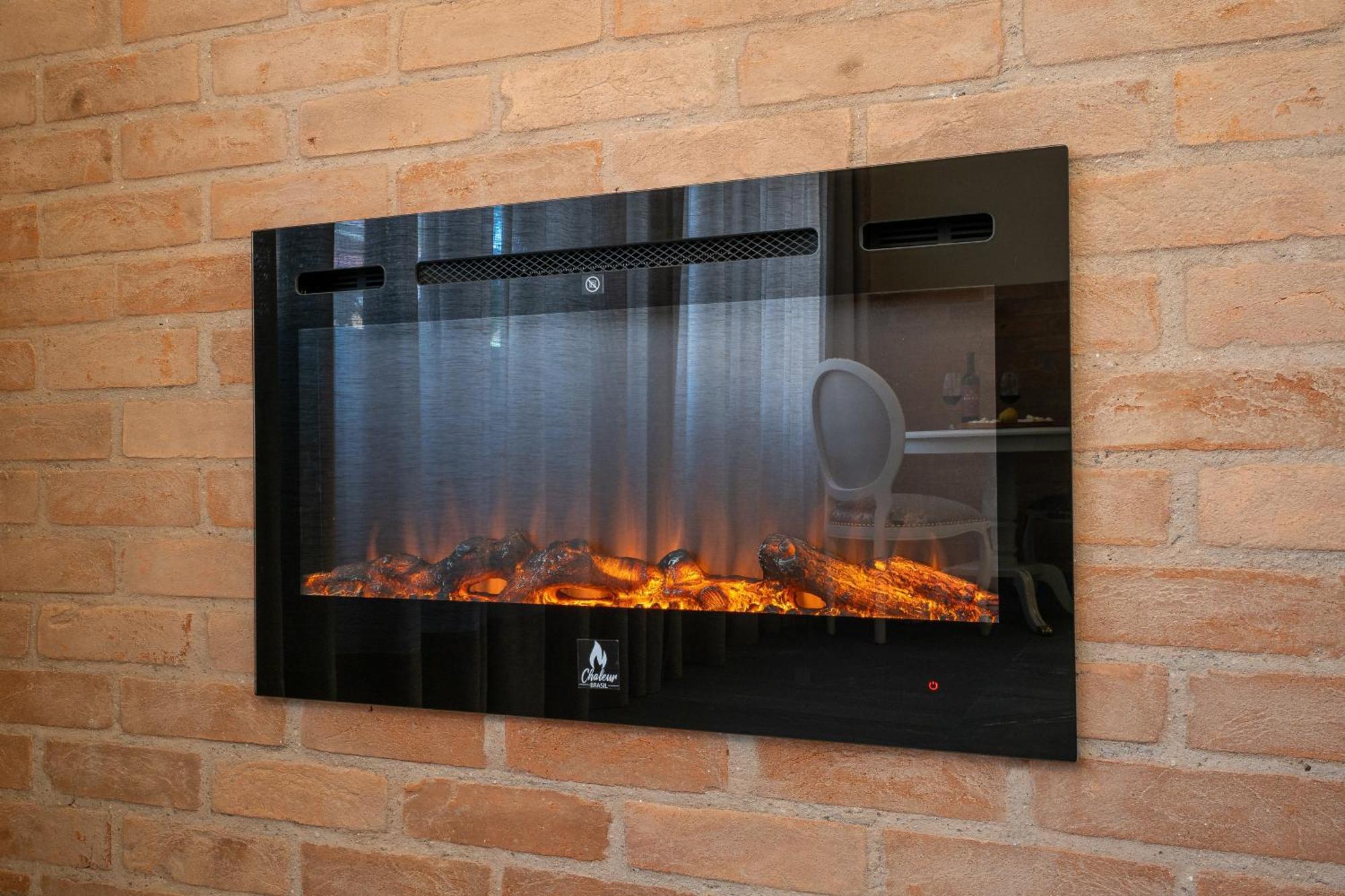 Pousada Luis XV Кампус-ду-Жордау Экстерьер фото A wall mounted electric fireplace